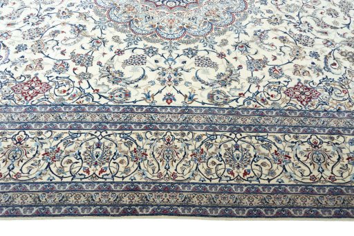 Corner detail of 2000s Nain rug showing border pattern and Cork pile
