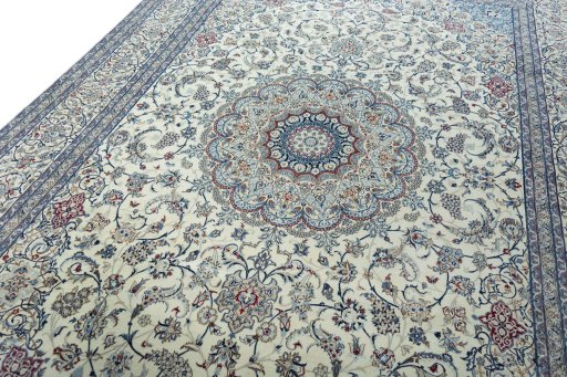 Backside of handmade 2000s Nain rug showing knot structure and weave density