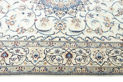 Corner detail of New Nain rug showing border pattern and Wool pile