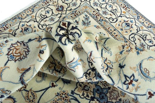 Surface texture of New Nain rug with natural Wool and intricate pattern
