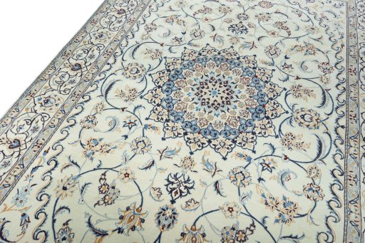 Backside of handmade New Nain rug showing knot structure and weave density