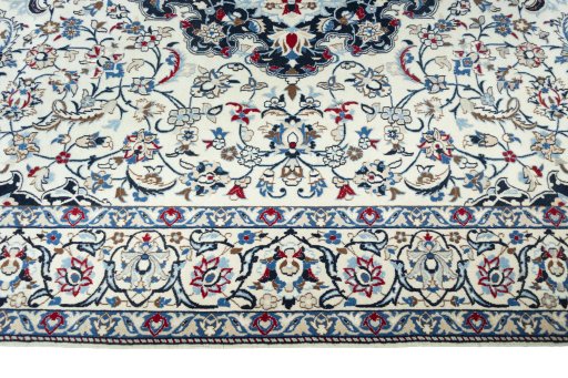 Corner detail of New Nain rug showing border pattern and Wool pile