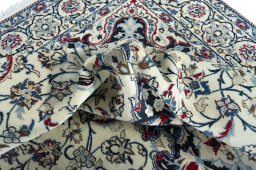 Surface texture of New Nain rug with natural Wool and intricate pattern