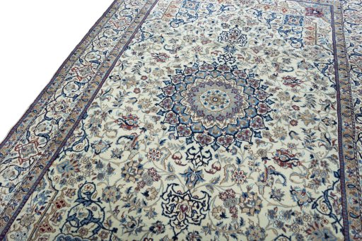 Backside of handmade 2000s Nain rug showing knot structure and weave density