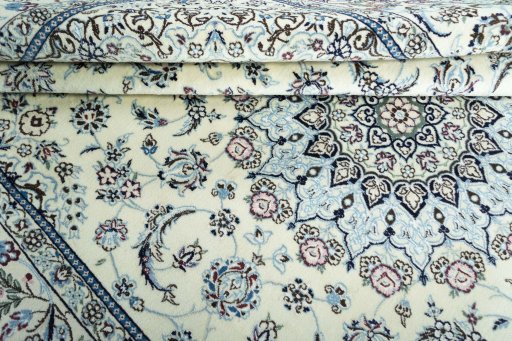 Close-up detail of New Nain rug from Iran / Persia showing Wool weave