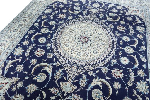 Backside of handmade New Nain rug showing knot structure and weave density