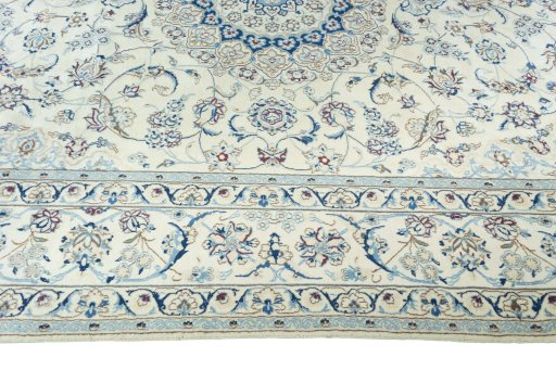 Corner detail of New Nain rug showing border pattern and Wool pile