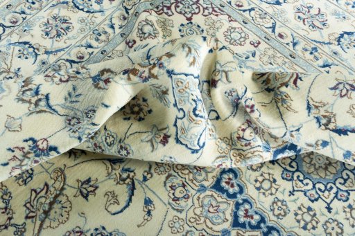 Surface texture of New Nain rug with natural Wool and intricate pattern