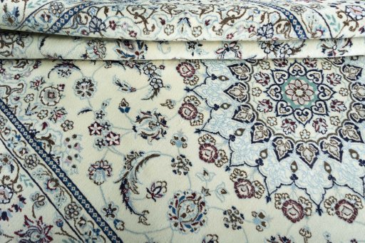 Close-up detail of 2000s Nain rug from Iran / Persia showing Wool weave