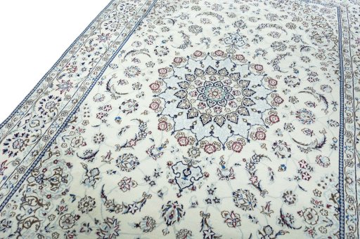 Backside of handmade 2000s Nain rug showing knot structure and weave density