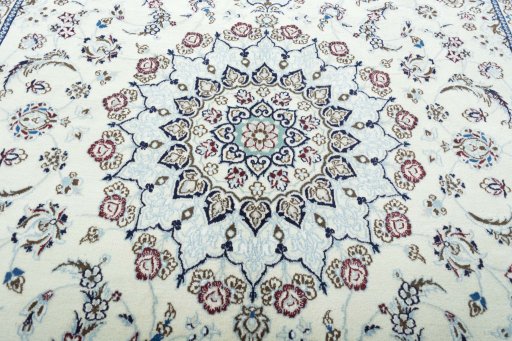 Central medallion detail of 2000s Nain rug from Iran / Persia