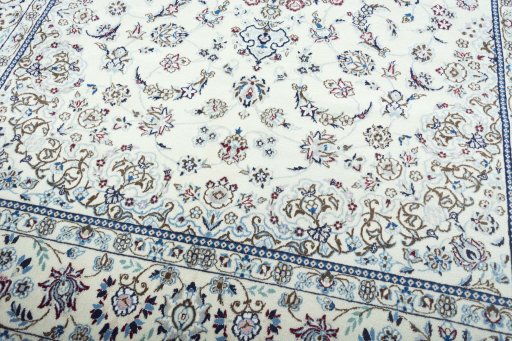 Close-up detail of 2000s Nain rug from Iran / Persia showing Wool weave