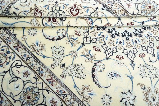 Close-up detail of New Nain rug from Iran / Persia showing Wool weave