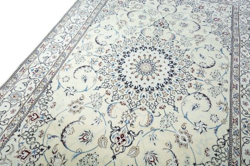Backside of handmade New Nain rug showing knot structure and weave density