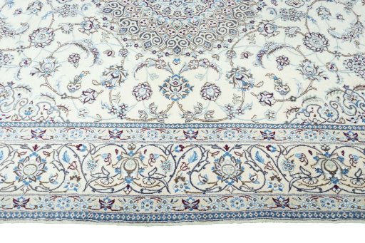 Corner detail of New Nain rug showing border pattern and Wool pile