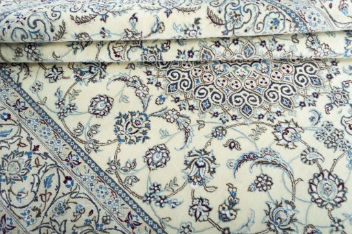 Close-up detail of New Nain rug from Iran / Persia showing Wool weave
