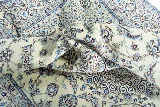Surface texture of New Nain rug with natural Wool and intricate pattern