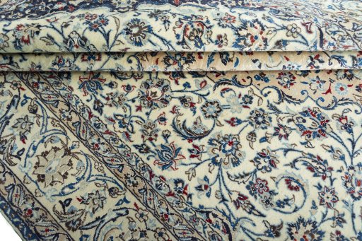 Close-up detail of 2000s Nain rug from Iran / Persia showing Wool weave