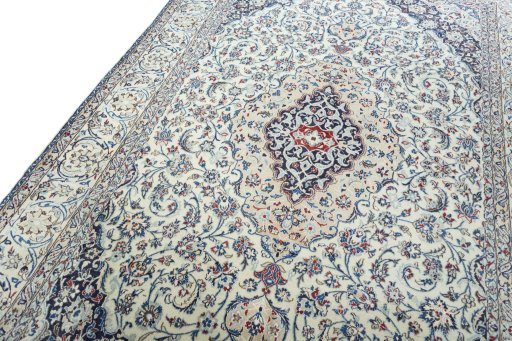 Backside of handmade 2000s Nain rug showing knot structure and weave density