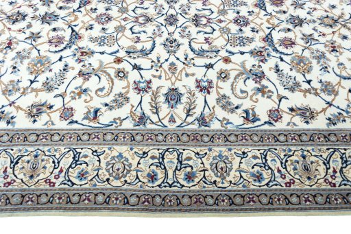 Corner detail of 2000s Nain rug showing border pattern and Wool pile