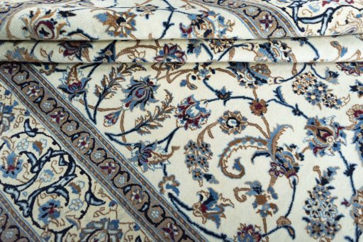 Close-up detail of 2000s Nain rug from Iran / Persia showing Wool weave