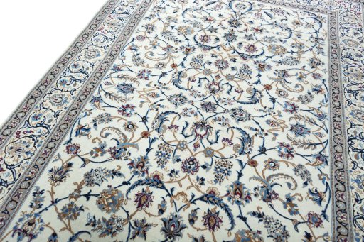 Backside of handmade 2000s Nain rug showing knot structure and weave density