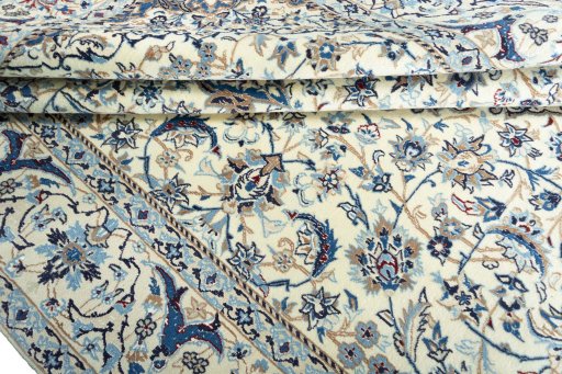 Close-up detail of 2000s Nain rug from Iran / Persia showing Wool weave