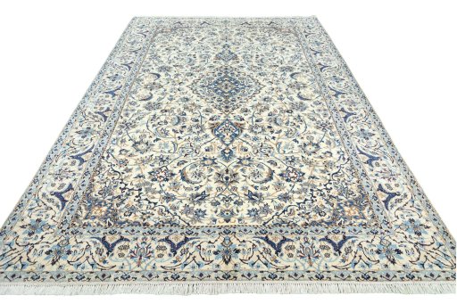 Surface texture of 2000s Nain rug with natural Wool and intricate pattern