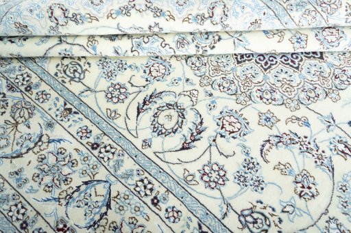 Close-up detail of New Nain rug from Iran / Persia showing Wool weave