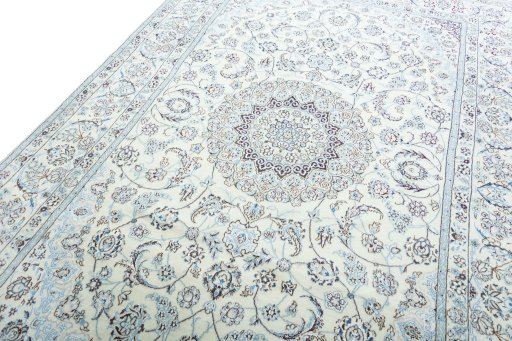 Backside of handmade New Nain rug showing knot structure and weave density