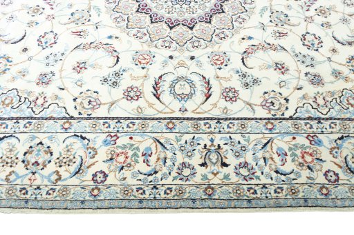 Corner detail of 2000s Nain rug showing border pattern and Wool pile