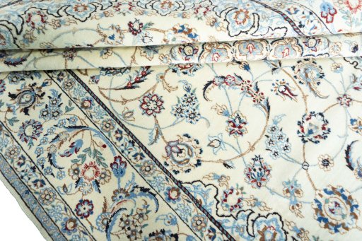 Close-up detail of 2000s Nain rug from Iran / Persia showing Wool weave