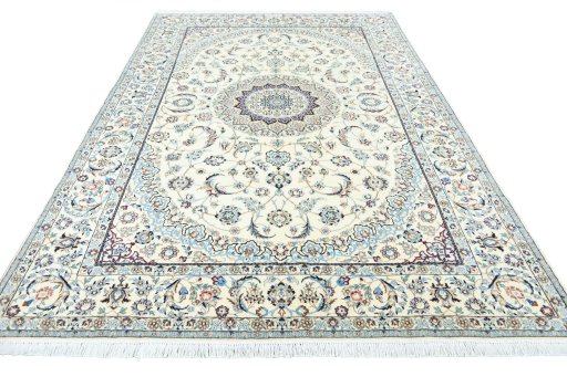 Surface texture of 2000s Nain rug with natural Wool and intricate pattern