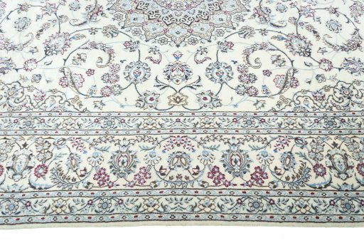 Corner detail of New Nain rug showing border pattern and Wool pile