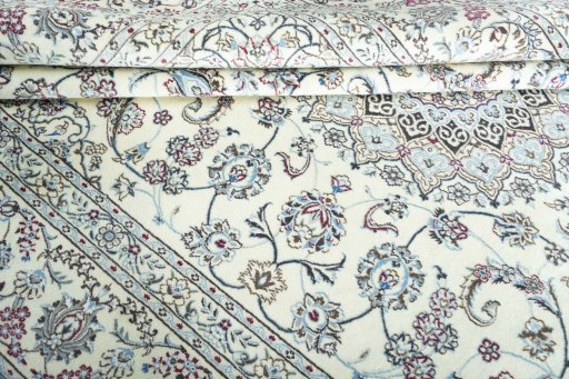Close-up detail of New Nain rug from Iran / Persia showing Wool weave