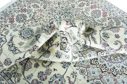 Surface texture of New Nain rug with natural Wool and intricate pattern