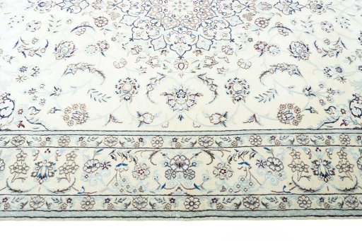 Corner detail of New Nain rug showing border pattern and Wool pile