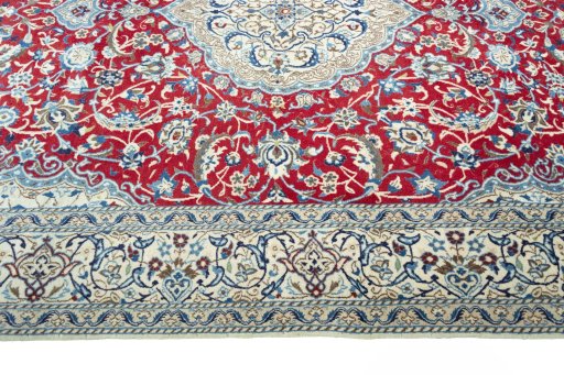 Corner detail of 2000s Nain rug showing border pattern and Wool pile