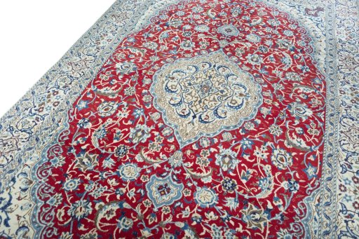 Backside of handmade 2000s Nain rug showing knot structure and weave density