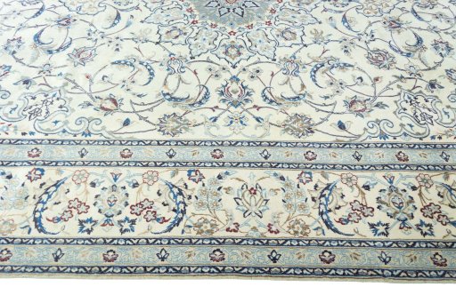Corner detail of 2000s Nain rug showing border pattern and Wool pile