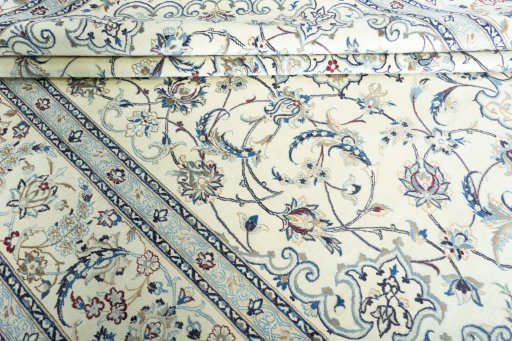 Close-up detail of 2000s Nain rug from Iran / Persia showing Wool weave