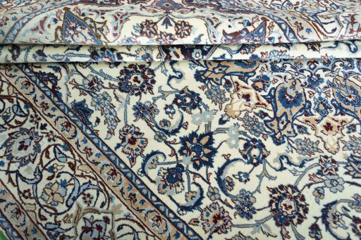 Close-up detail of 2000s Nain rug from Iran / Persia showing Wool weave