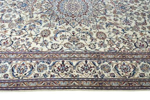 Corner detail of 2000s Nain rug showing border pattern and Wool pile