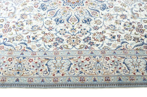 Corner detail of New Nain rug showing border pattern and Wool pile