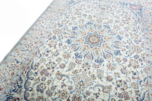 Backside of handmade New Nain rug showing knot structure and weave density