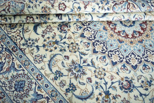 Close-up detail of 2000s Nain rug from Iran / Persia showing Wool weave