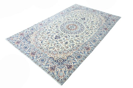Corner detail of 2000s Nain rug showing border pattern and Wool pile