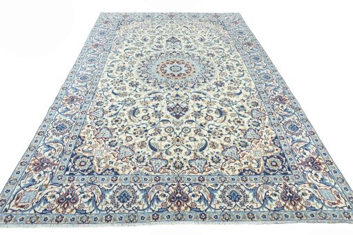 Surface texture of 2000s Nain rug with natural Wool and intricate pattern