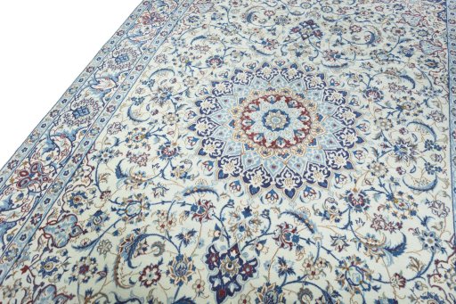 Backside of handmade 2000s Nain rug showing knot structure and weave density