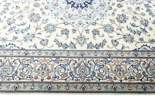 Corner detail of New Nain rug showing border pattern and Wool pile